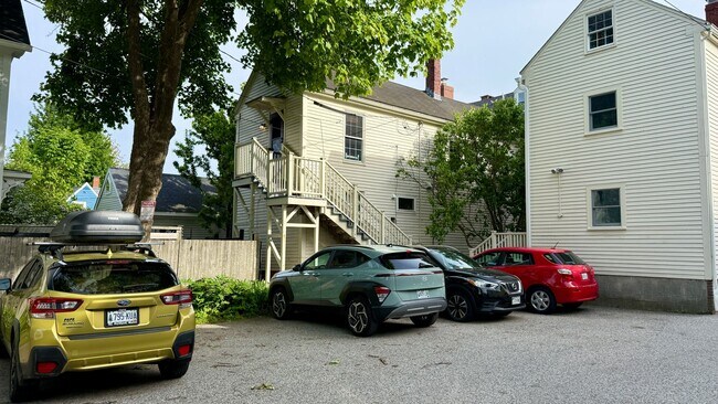 Building Photo - All Inclusive West End Condo-Fully Furnished with Parking!