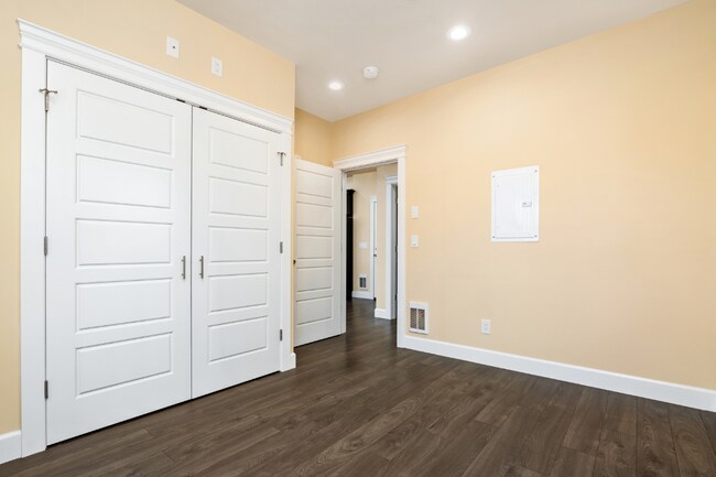 Building Photo - Spacious Two-Bedroom, Two-Bath Living at Marigold Apartments — Available Now