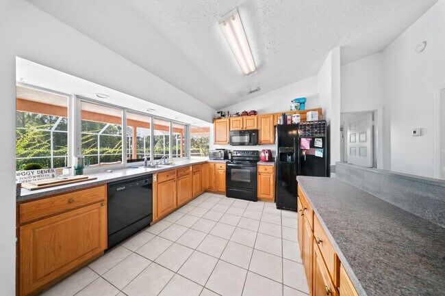 Building Photo - 5910 NW Bayou Ct