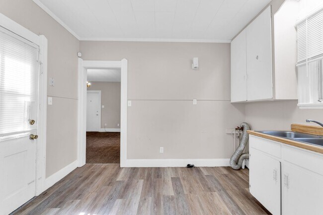 Building Photo - Charming Home with Updates and Covered Porch - A Must-See!