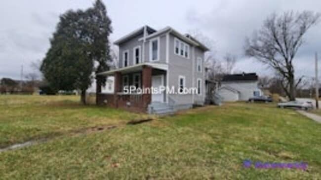 Building Photo - 9804 Miles Ave