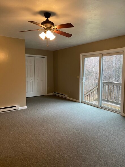 Living Room with closet nook & slider to deck - 28 Quaboag St