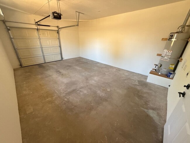 Building Photo - Updated Property with Large Front & Backyard
