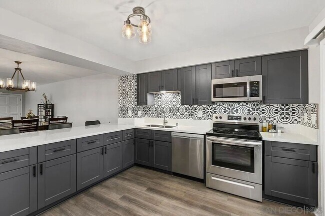 Building Photo - Premium Gated Townhome in Bonita Willows — A Perfect Blend of Comfort & Lifestyle