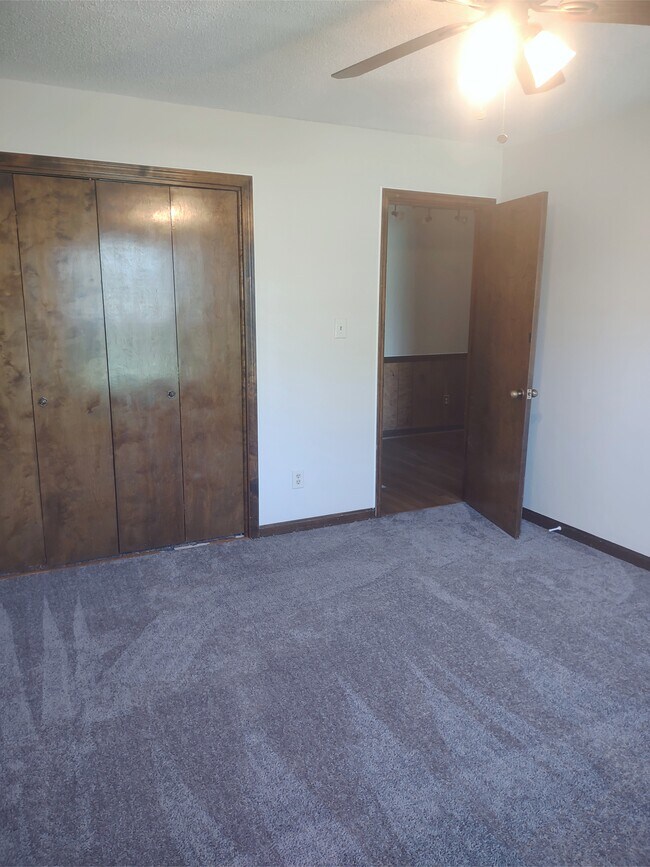 Spare bedrooms with closet space. - 120 Arrow Lands Trl