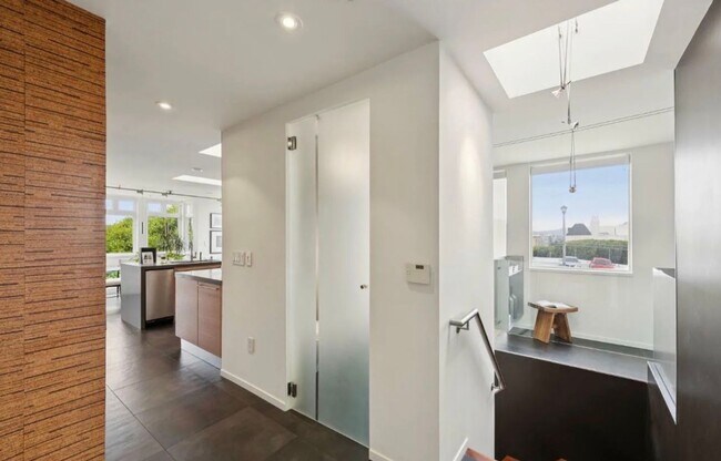 Building Photo - One-of-a-Kind Sophisticated Top-Floor Cond...