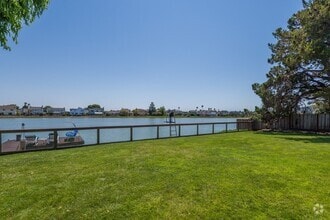Building Photo - Luxury Waterfront Living with Patio & Fenc...