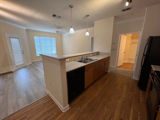 Building Photo - Gardens of Bridgehampton is a luxury condo...