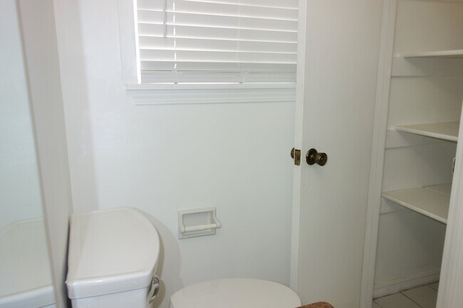 Bathroom linen closet on right - 3421 E 35th St