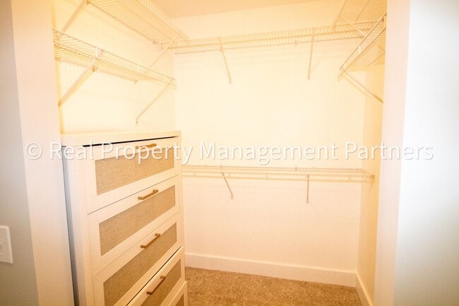 Building Photo - Spacious 3BR Townhome in Lowell | Nature Views & Maintenance-Free Living