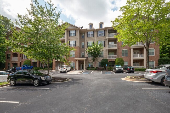 Building Photo - Top-Floor Corner Condo in Prime Location — Minutes to The Battery & Chattahoochee Trails