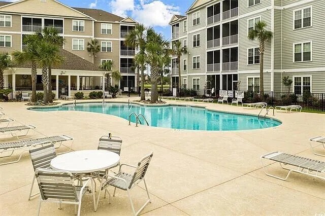 Building Photo - Coming Soon! Great Three Bedroom Condo in Myrtle Beach with Pool and Just 4 Miles to Beach!