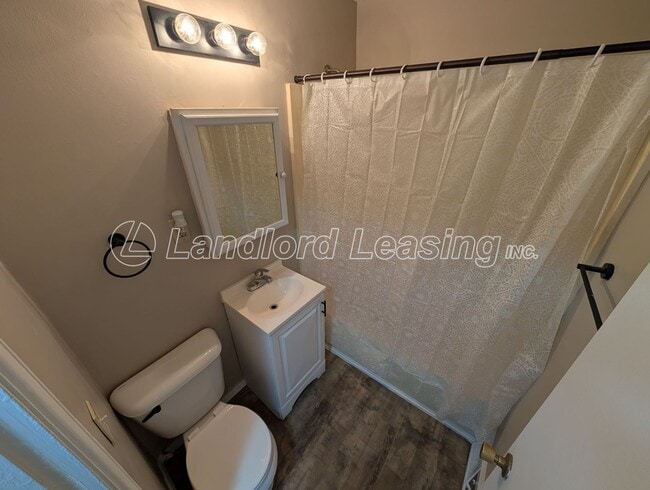 Building Photo - Updated Cape Cod with New Flooring, Front Deck & Garage