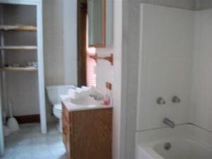 Building Photo - VANDALIA - 3 Bedroom, Large Garage & Fenced Yard -ONLY  $999 DOWN