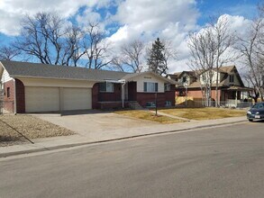 Building Photo - ***AVAILABLE NOW***

Spacious 4-Bedroom Wheat Ridge Home with Finished Garden Level and Two-Car G...