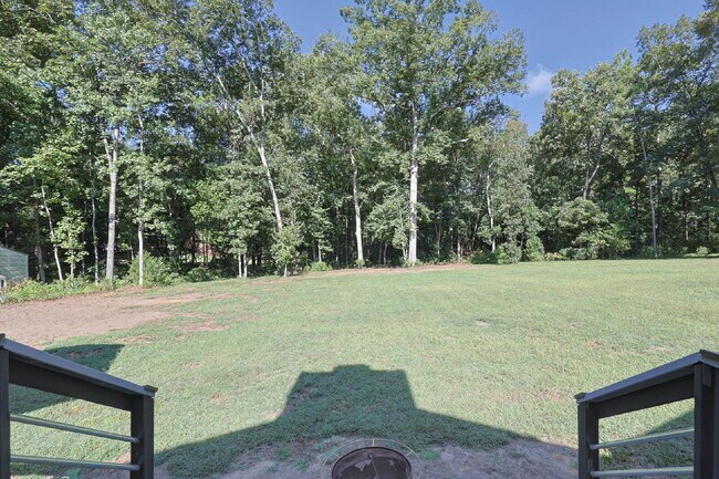 Building Photo - COMING SOON · Designer Renovation · Covered Deck Pavilion · 2-Car Garage · Lawn Care Included