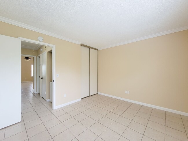 Building Photo - Welcome to This Charming Townhome Nestled ...