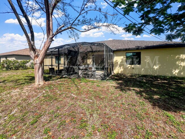Building Photo - 3BR/2BA Cape Coral Rental - Washer... Dryer... Screened Lanai... This One Came Prepared