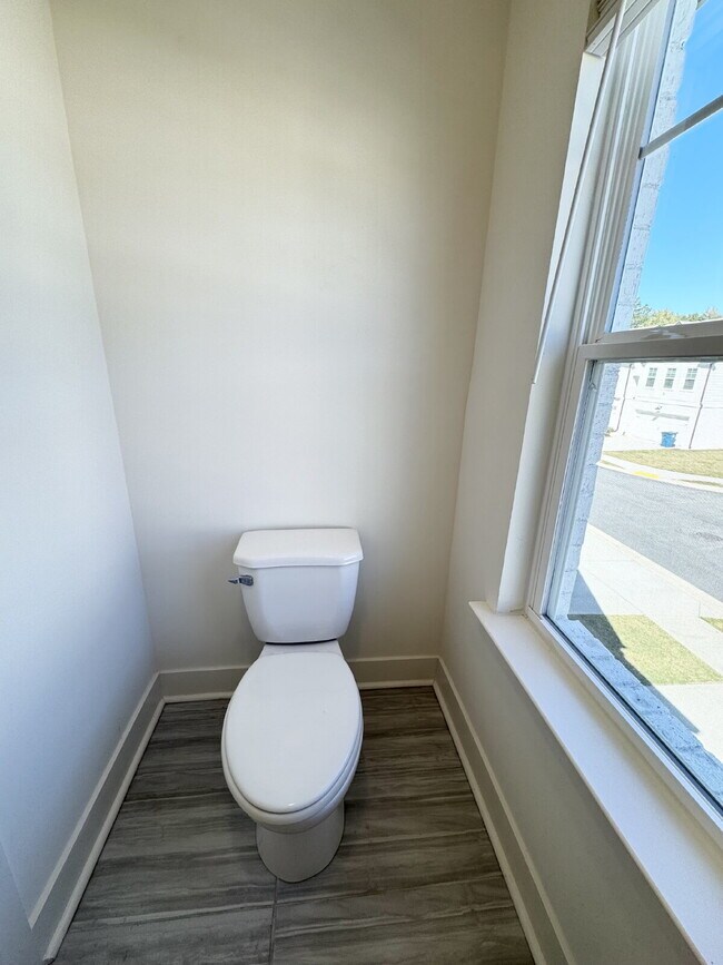Building Photo - Stylish 3BR Townhome with Private Yard & T...