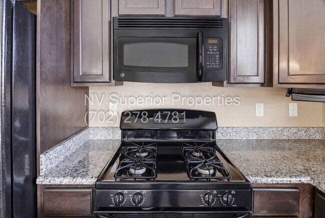 Building Photo - NW!! 4 Bedrooms!!! One Bedroom Down!!  Pool!!! Tankless Hot Water Heater!! Court yard at entrance...