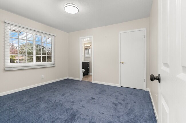 Building Photo - Charming Updated Home With Drive-Through Garage Access