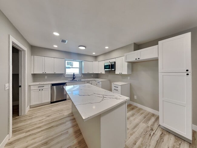 Building Photo - UPDATED AND MODERN! EVERYTHING IS NEW! $50...