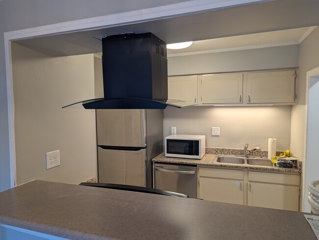 Kitchen from dining room - 179 Old Montgomery Highway