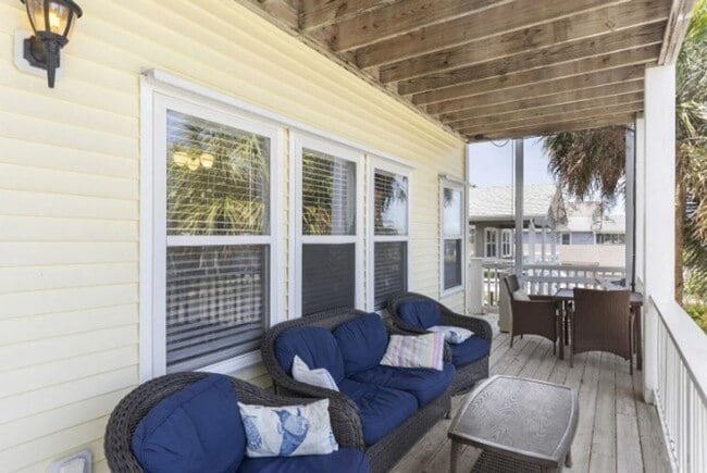 Building Photo - PRICE REDUCTION! LIVE AT THE BEACH FOR THE...