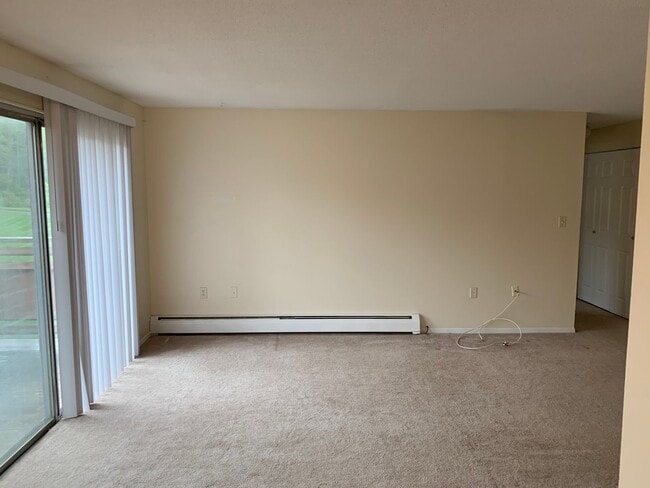 Building Photo - Upper Level Unit With Heat and Hot Water I...