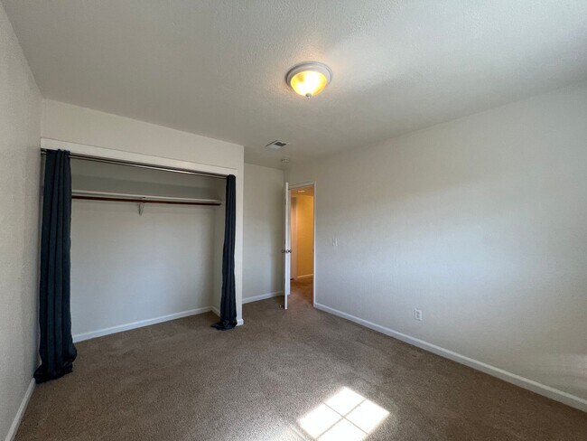 Building Photo - Spacious 1,196 Square Foot  4BR Home Across from Technology High School | Large Yard & 2-Car Garage"