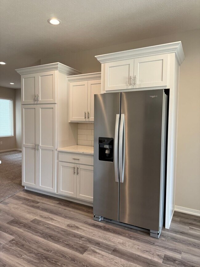 Building Photo - Brand new ranch townhome with 3 stall garage. Spacious 2 bedrooms with walk in closets, 2.5 bathr...