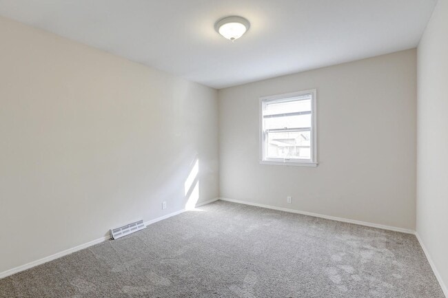 Building Photo - Split-Level Home With Fenced Yard In Quiet Residential Area