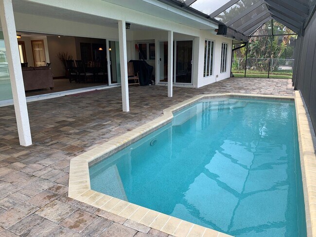 Building Photo - AVAILABLE 2027 SEASON! ! PGI HEATED POOL, WATERFRONT, BOAT LIFT