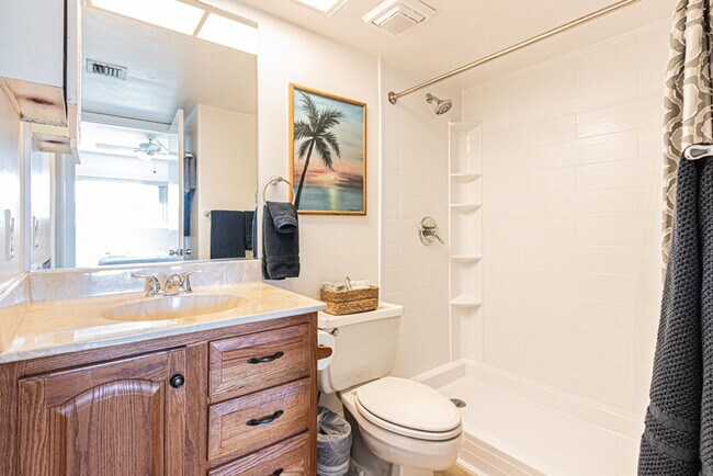 Building Photo - AVAILABLE NOW! Furnished Ground-Floor End Unit | Lake & Pool Views | Minutes to Marco Island & Do...