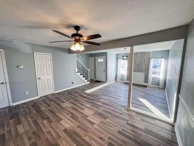 Building Photo - Introducing our spacious townhouse located...