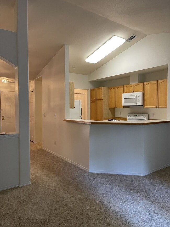 Building Photo - Bright, Spacious, Updated Condo with Separ...