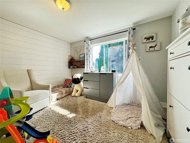 Building Photo - Remodeled 3 bdrm home on a large lot with 500 sq ft wrap around deck!