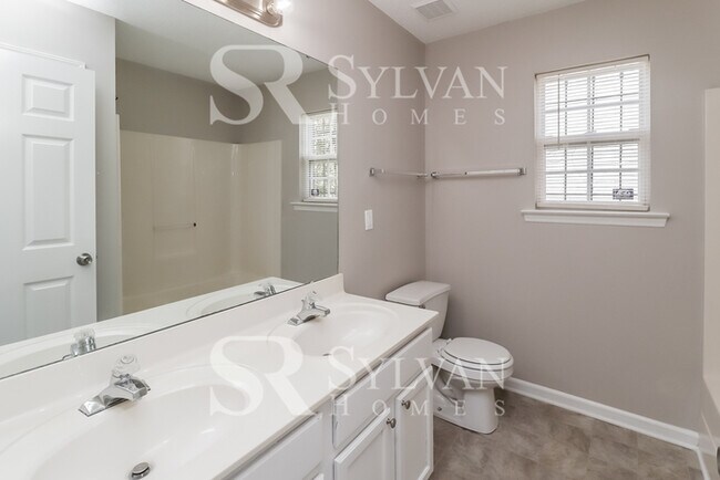 Building Photo - Turn the key. Enter. Smile. Repeat every day!