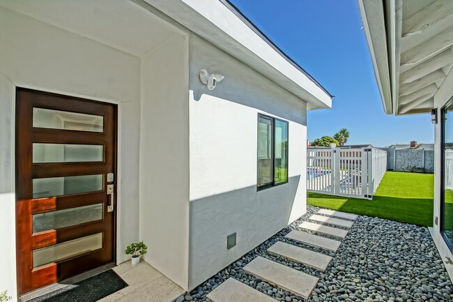Building Photo - Beautifully Remodeled, Bright & Modern 4BR3BA Home w/ 2BR1BA Guest House On Sprawling Corner Lot ...