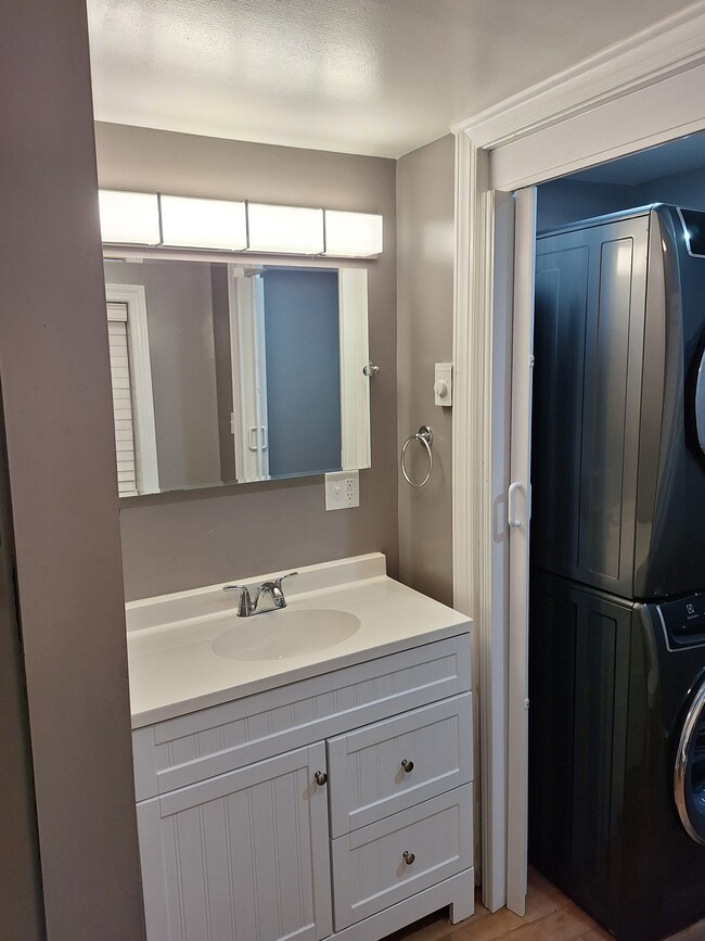 Downstairs bath with stand up shower and new washer and dryer - 7237 Lincoln Way W