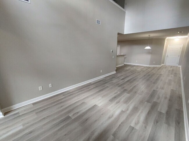 Building Photo - BRAND NEW FLOORING & FRESH PAINT - 3 Bedroom/2.5 Bath Townhome with garage in Wild Wing!