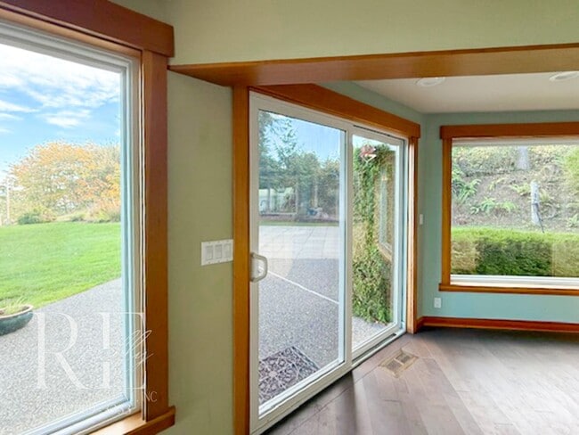 Building Photo - Waterfront Rustic Retreat with Vaulted Ceilings, Picture Windows & Lofted Nook