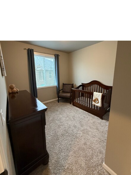 Building Photo - 9008 W Caelen Ave