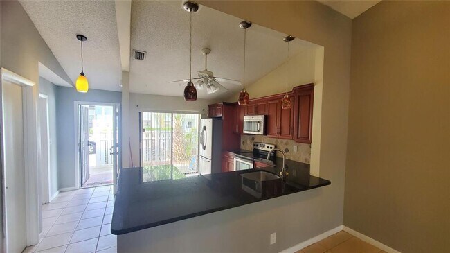 Building Photo - 3853 Carambola Cir N