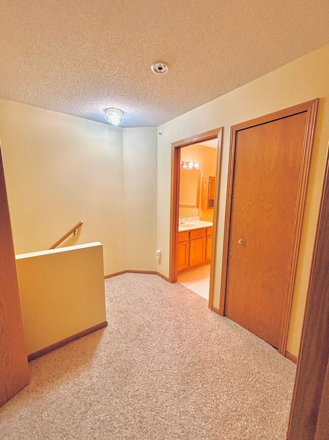 Building Photo - 2 Bedroom Townhome Nestled in The Heart of...