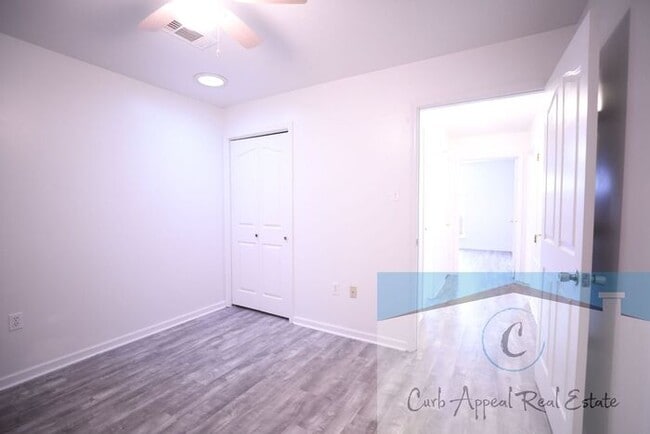Building Photo - First month move in special $900!! Beautiful 3-bed, 2 bath condo with 2-car garage - includes was...