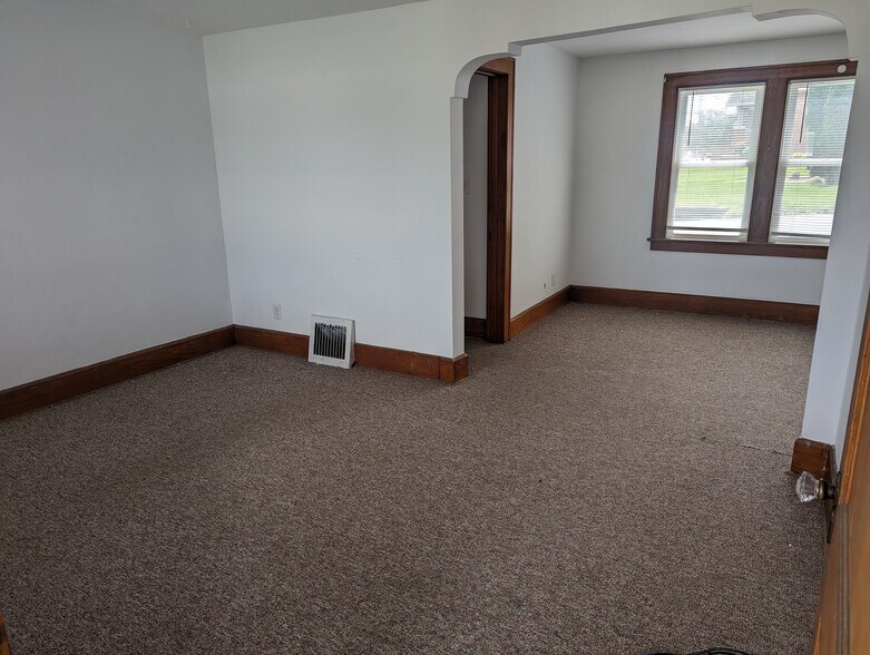 Arch between open concept dinning and living rooms - 1005 9th Ave