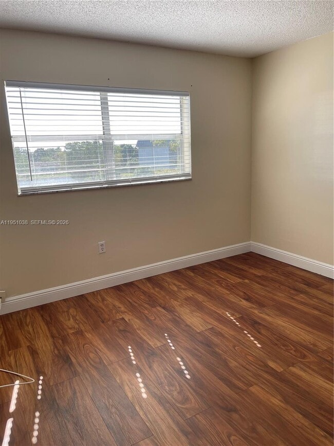 Building Photo - 8285 Sunrise Lakes Blvd