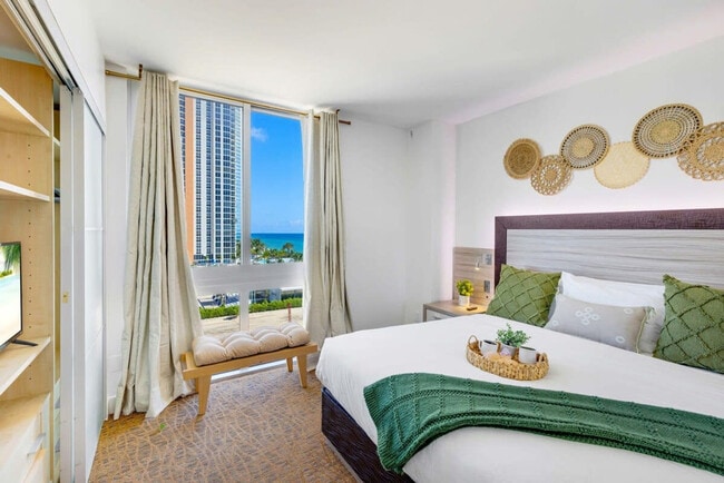 Building Photo - 18683 Collins Ave