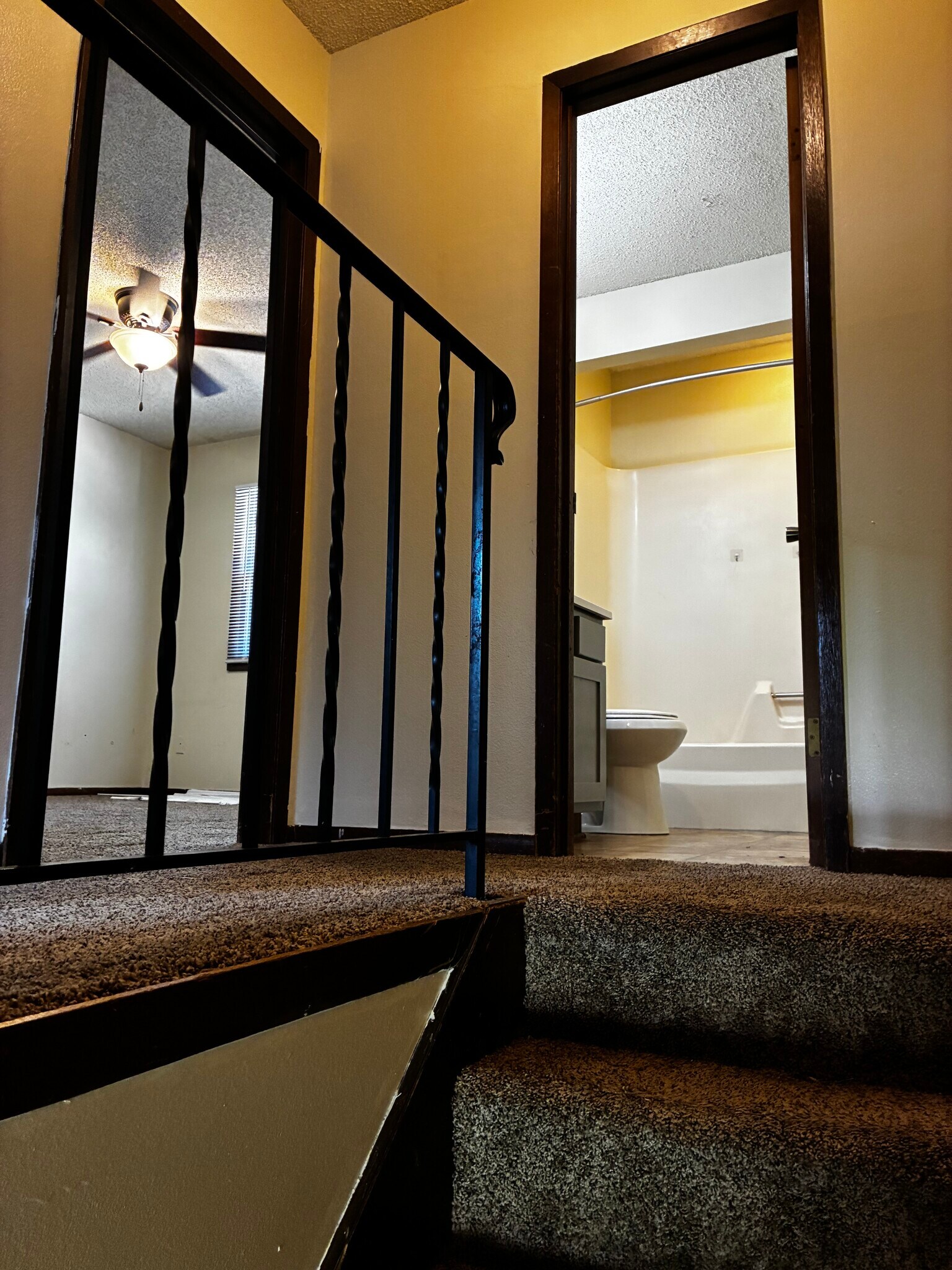 At the top of the stair, this shows the full bathroom and the rear bedroom - 1205 Randolph St